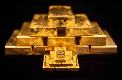 الذهب يتراجع مع تعزيز صعود النفط لتوقعات رفع أسعار الفائدة قبل اجتماع الاحتياطي الفيدرالي